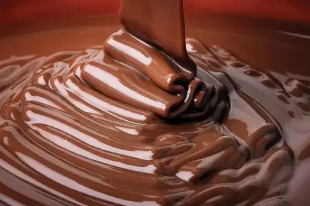 Sonhar com chocolate, tomar em sonhos significa saúde. Fazê-lo ou dá-lo a alguém, amizade. Ver muito chocolate exposto, abundância. Comprá-lo ou vendê-lo, lucros.